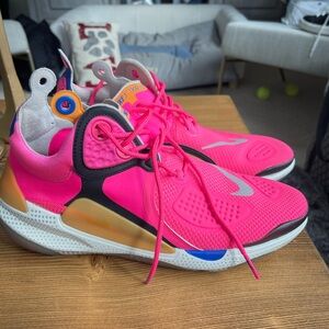 Sz 9 mens/ ladies Sz11 Nike Joyride Hyper Pink CC3